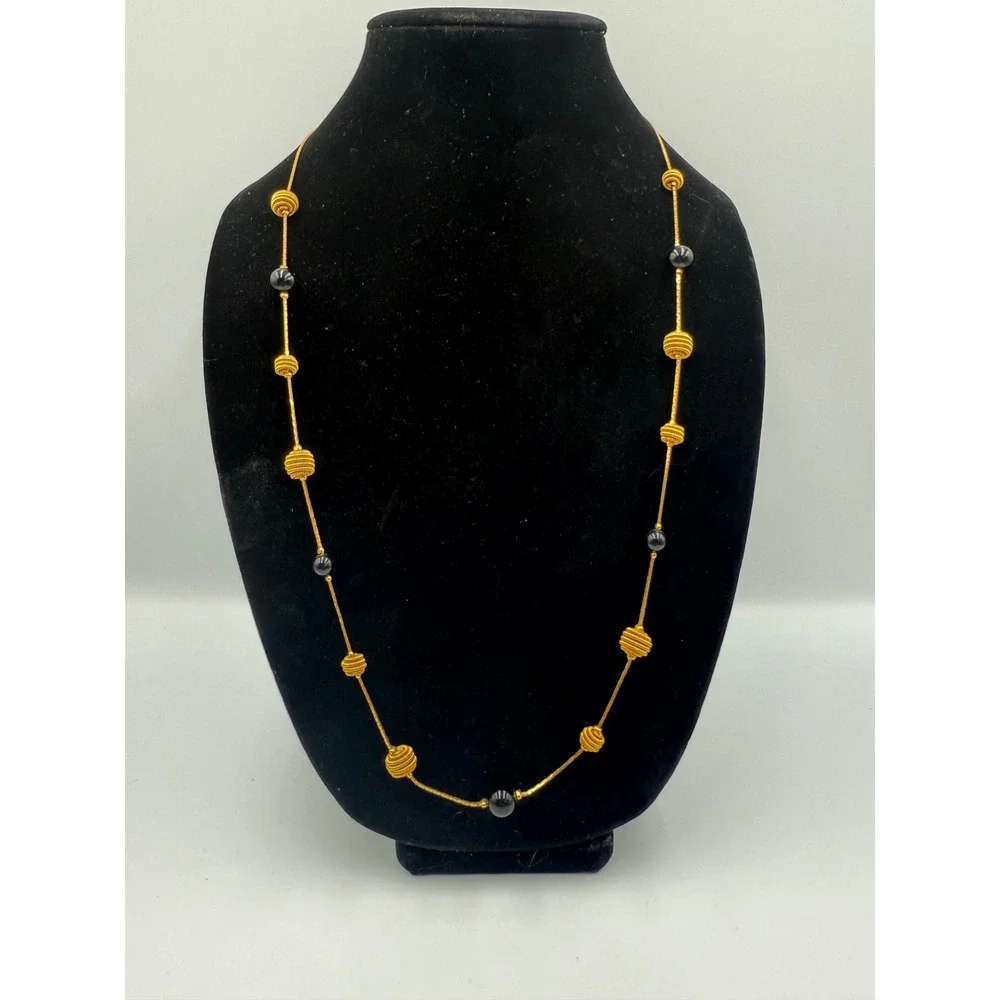 Vintage Gold Tone Station Necklace with Black Beads and Coiled Wire Accents